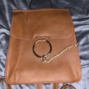 Brown leather backpack purse